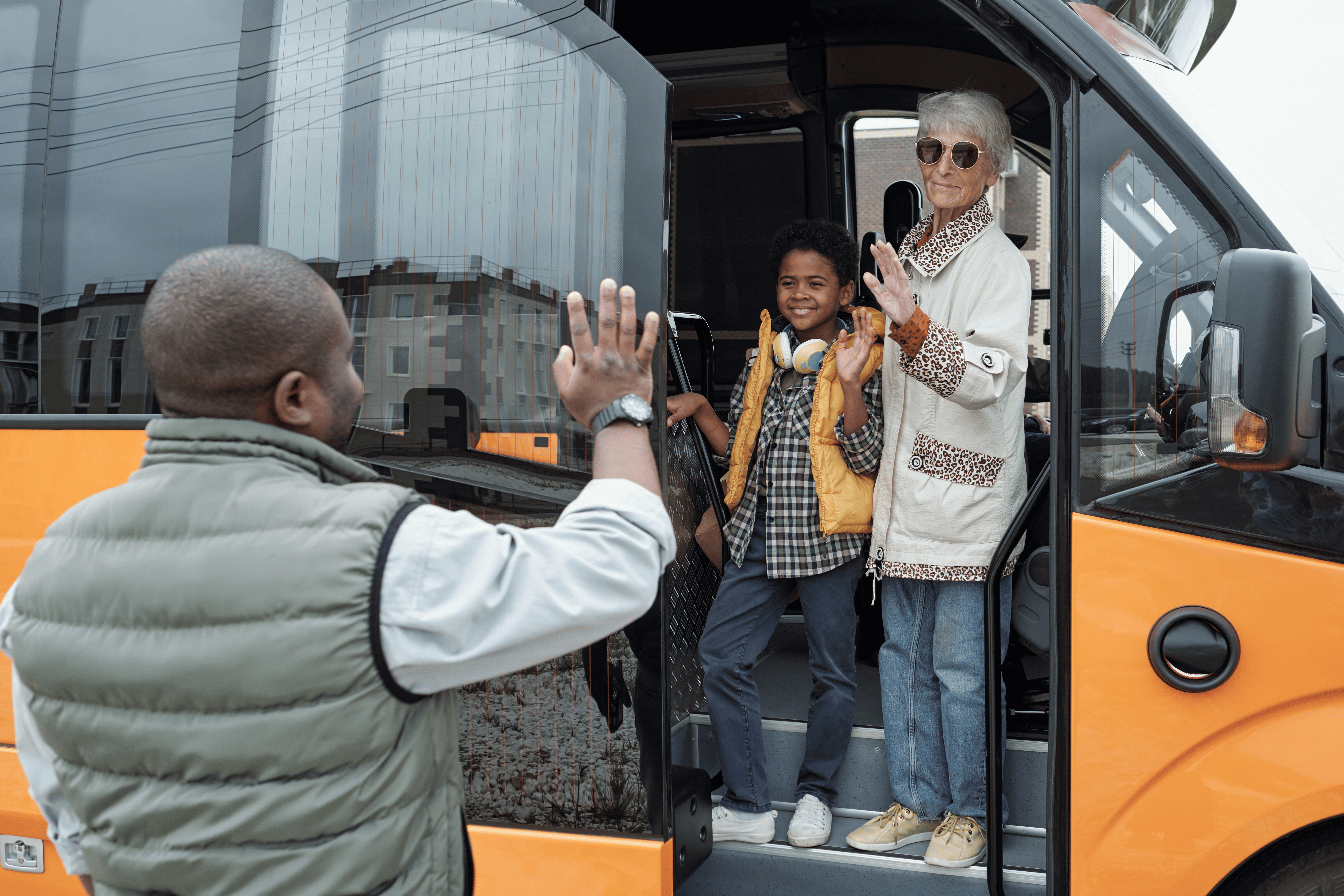 Students boarding a school transport vehicle near O'Hare